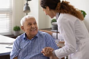 Patient speaking with a vein care provider during a consultation.